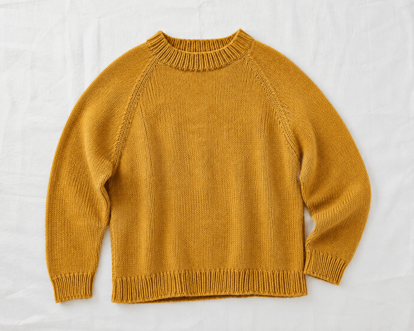 Åndstrikket sweater i merinould - str. M